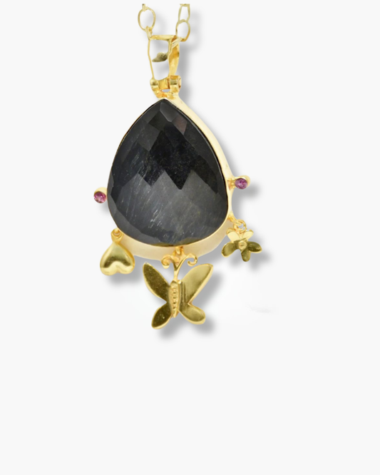 Handmade Pendant Showcasing A Checker-Cut Pear-Shaped Onyx