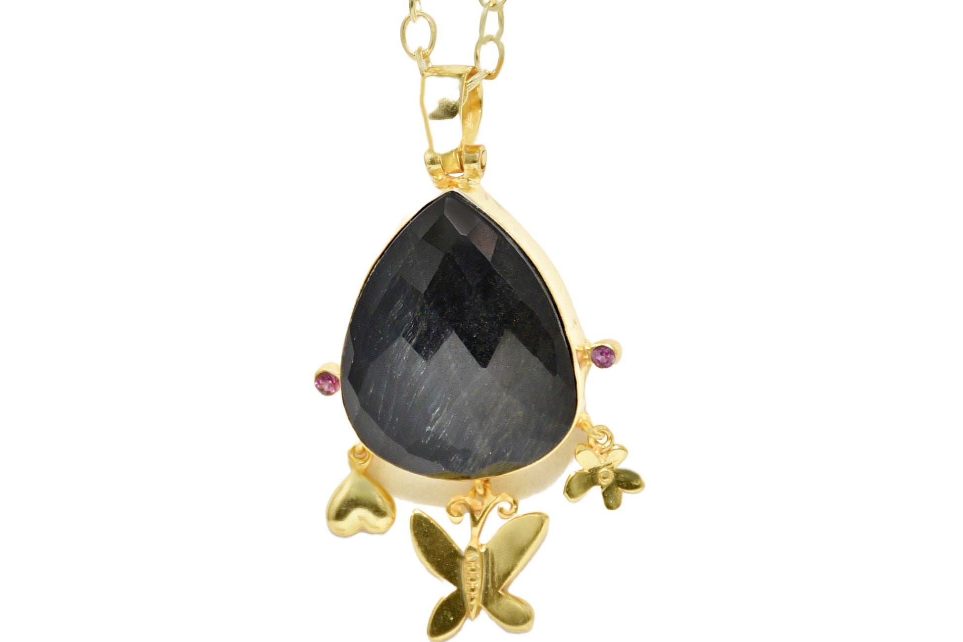 Handmade pendant showcasing a checker-cut pear-shaped Onyx
