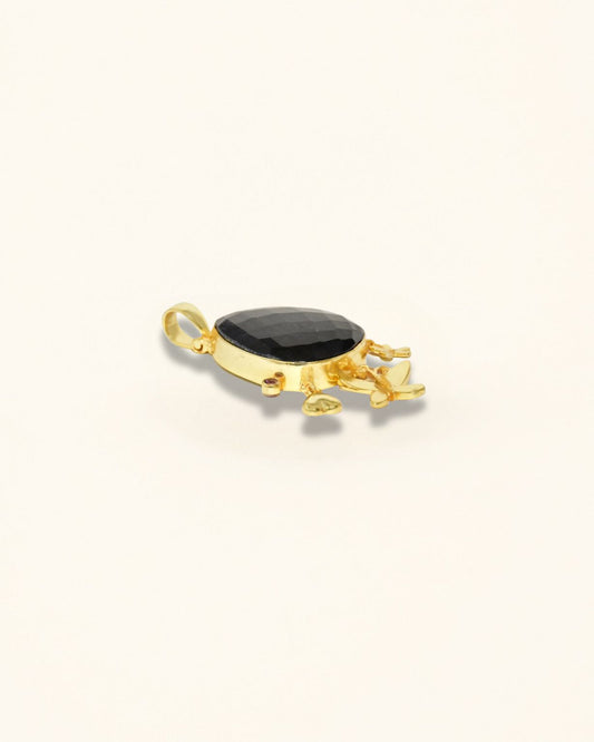 Handmade Pendant Showcasing A Checker-Cut Pear-Shaped Onyx