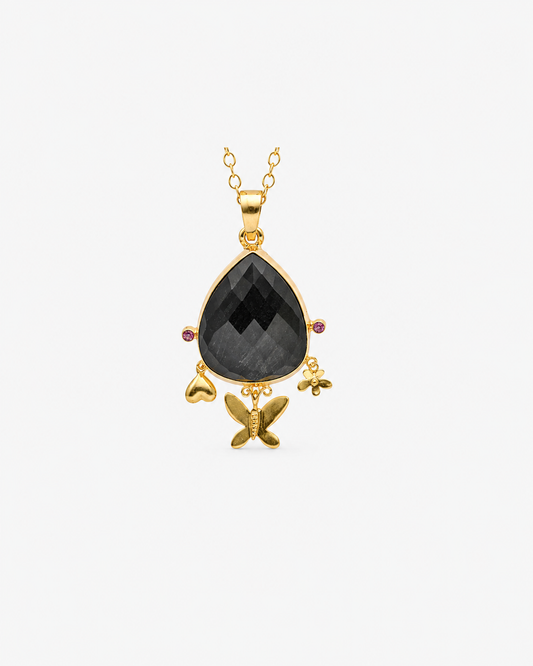 Handmade Pendant Showcasing A Checker-Cut Pear-Shaped Onyx